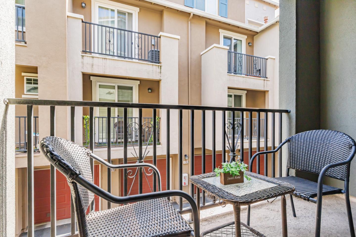 1744 Snell Place Milpitas, CA 95035 - Photo 27 of 35 a view of a chair and table in the balcony