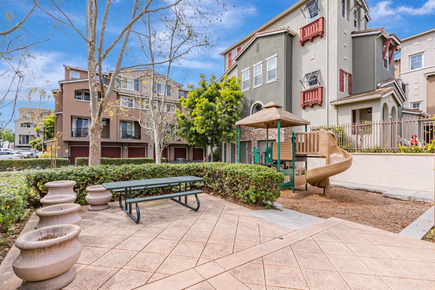1744 Snell Place Milpitas, CA 95035 - Photo 33 of 35 a front view of a building with sitting area