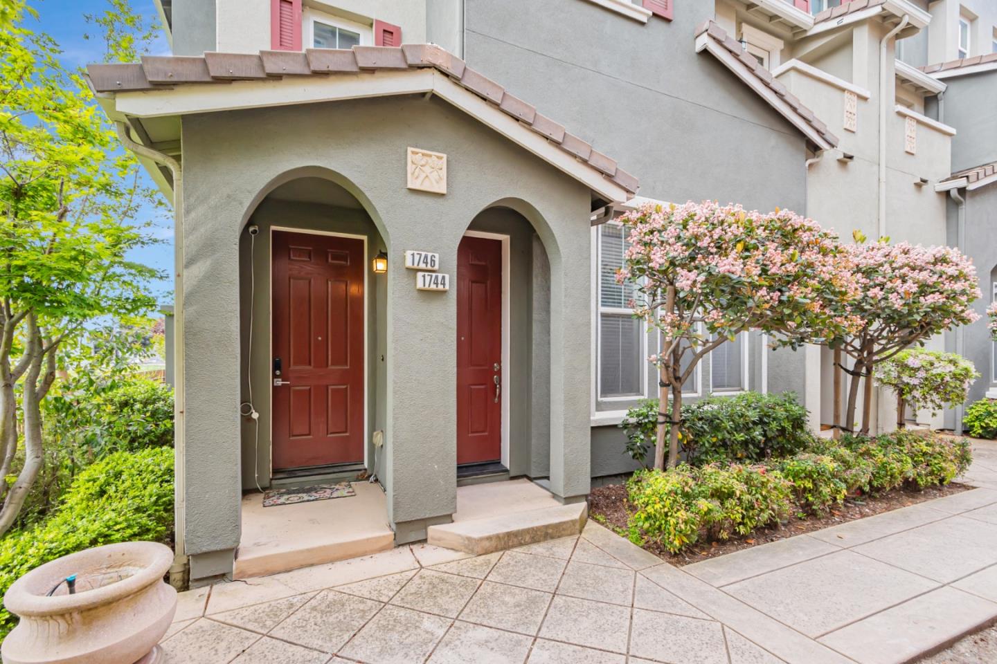 1744 Snell Place Milpitas, CA 95035 - Photo 5 of 35 a front view of a house with garden