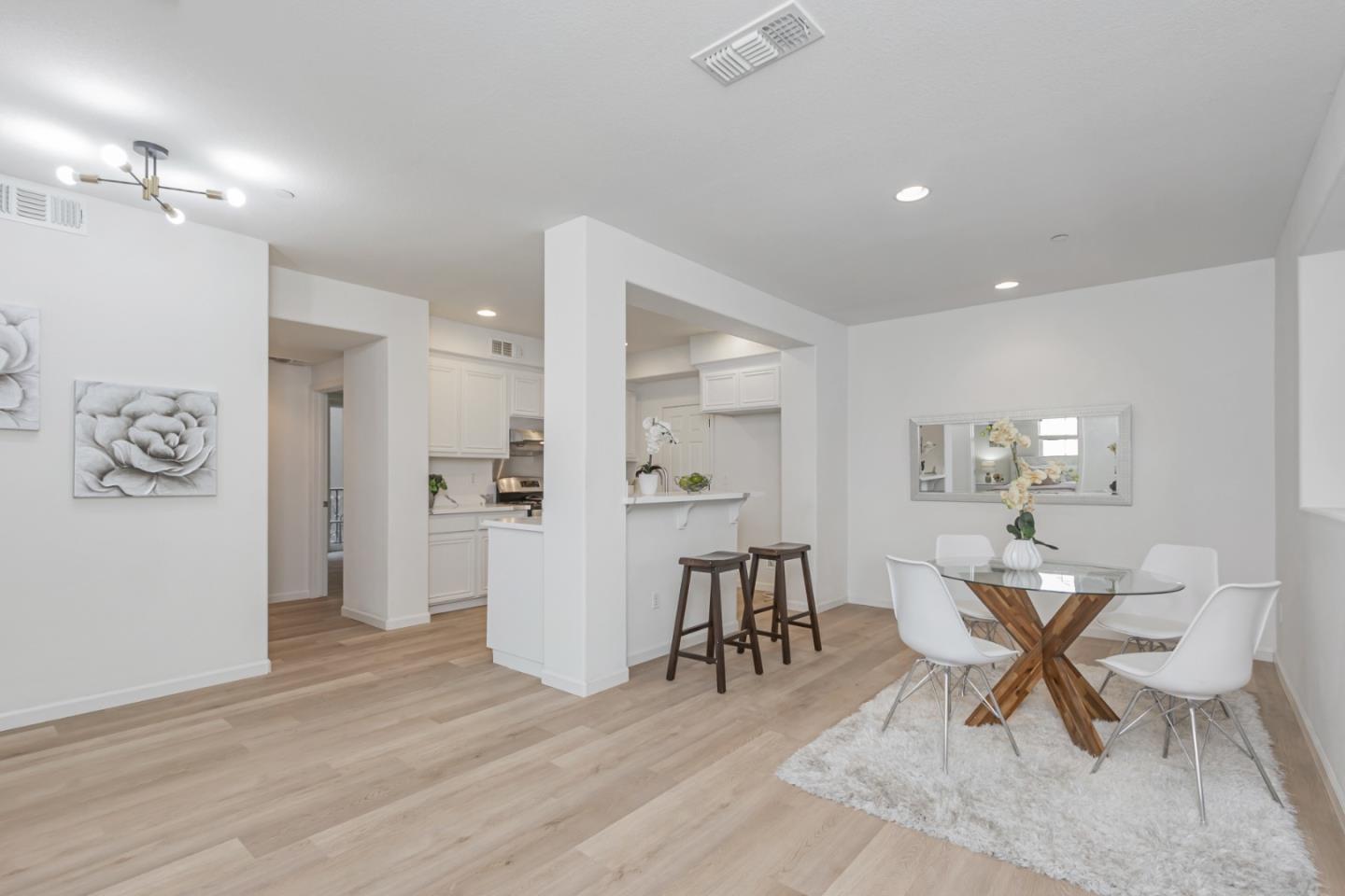 1744 Snell Place Milpitas, CA 95035 - Photo 9 of 35 a living room with furniture and a table