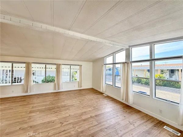 a view of an empty room and window