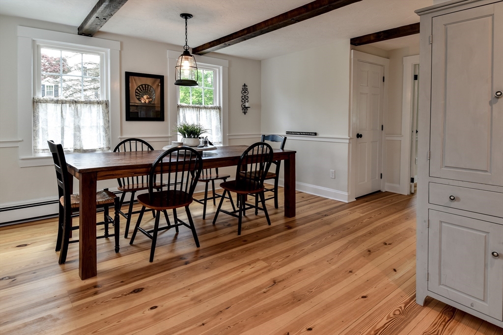 49 Hayden Rowe Street Hopkinton, MA 01748 - Photo 11 of 39 a view of a a dining room with furniture window and wooden floor
