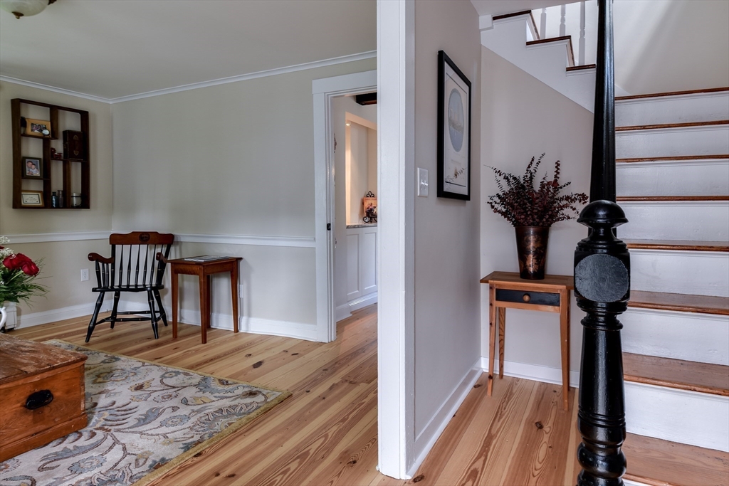 49 Hayden Rowe Street Hopkinton, MA 01748 - Photo 17 of 39 a view of a hallway with furniture and entryway