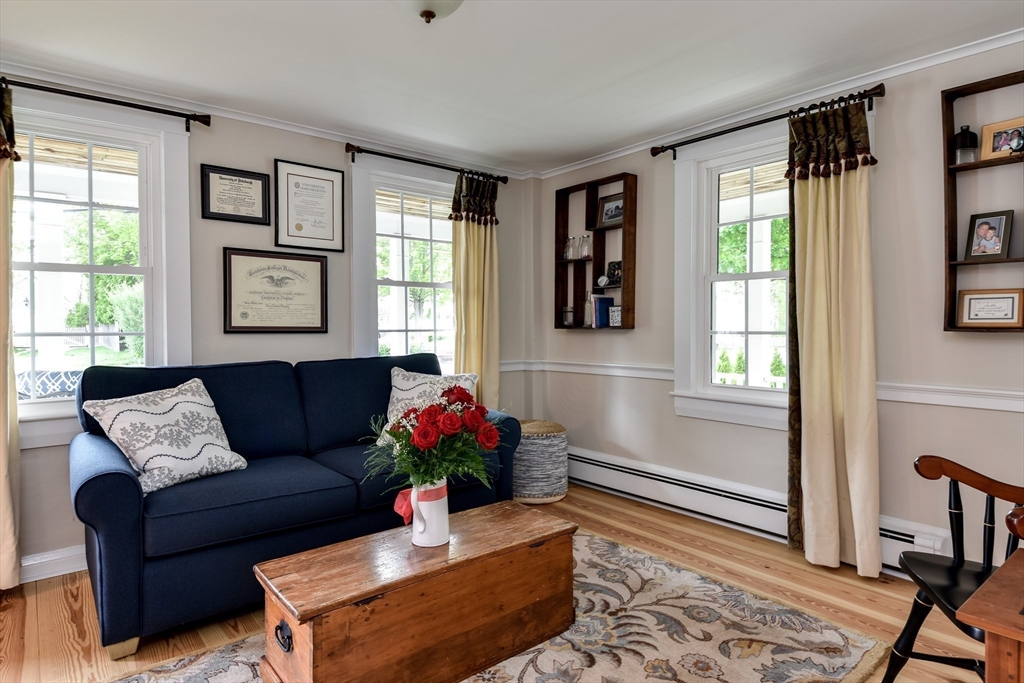 49 Hayden Rowe Street Hopkinton, MA 01748 - Photo 19 of 39 a living room with furniture and a window