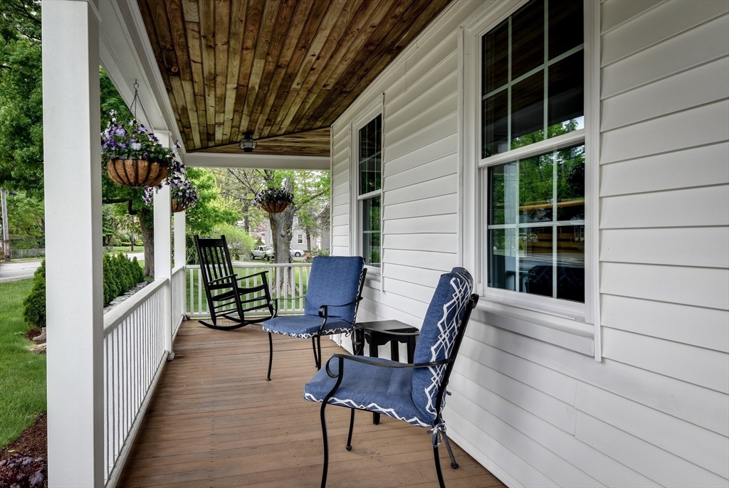 49 Hayden Rowe Street Hopkinton, MA 01748 - Photo 26 of 39 a view of balcony with furniture and garden