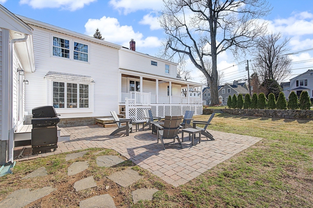 49 Hayden Rowe Street Hopkinton, MA 01748 - Photo 31 of 39 a view of a backyard with sitting area