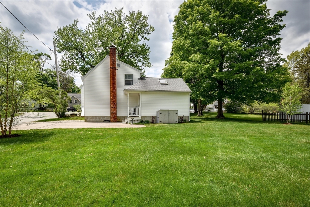 49 Hayden Rowe Street Hopkinton, MA 01748 - Photo 35 of 39 a view of a house with backyard and garden