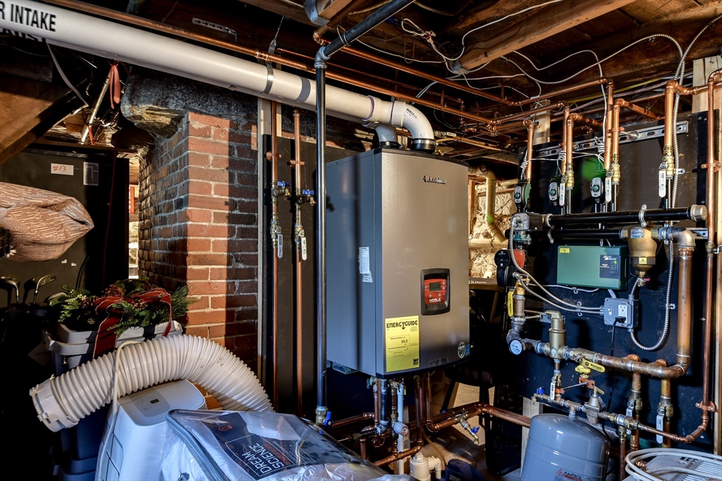 49 Hayden Rowe Street Hopkinton, MA 01748 - Photo 38 of 39 a view of a room with gym equipment