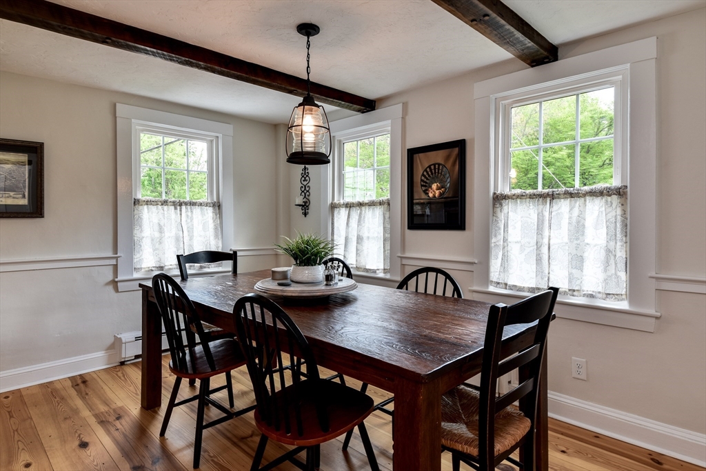 49 Hayden Rowe Street Hopkinton, MA 01748 - Photo 9 of 39 a view of a dining room with furniture window and outside view