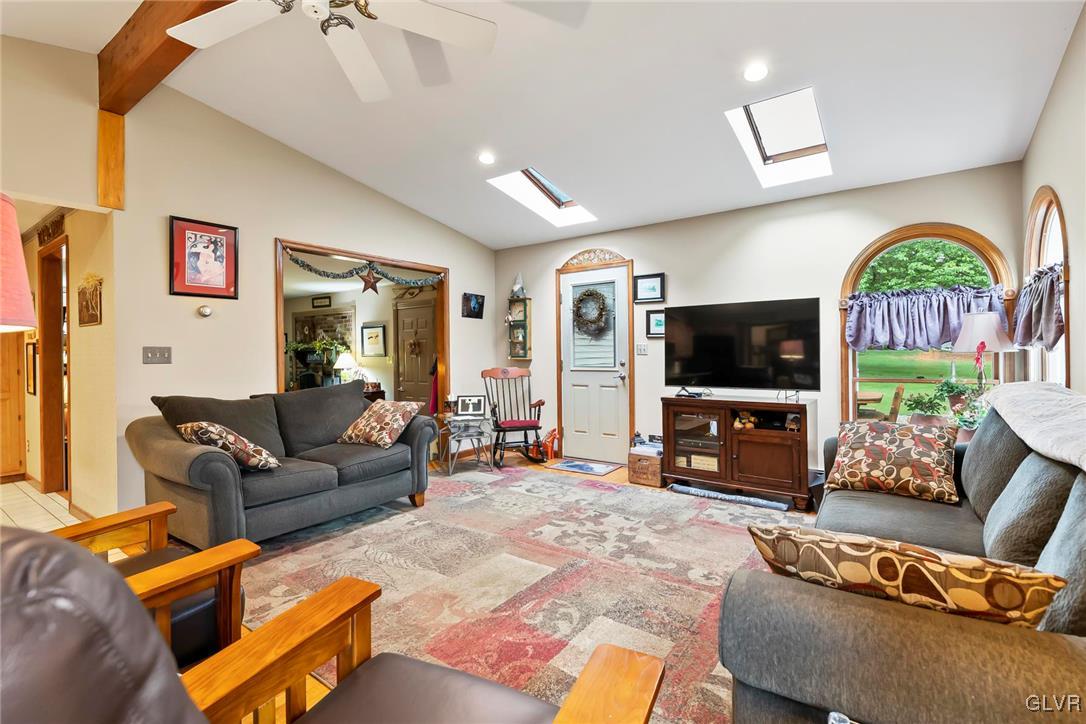 2744 Moore Circle Bath, PA 18014 - Photo 13 of 31 a living room with furniture and a flat screen tv