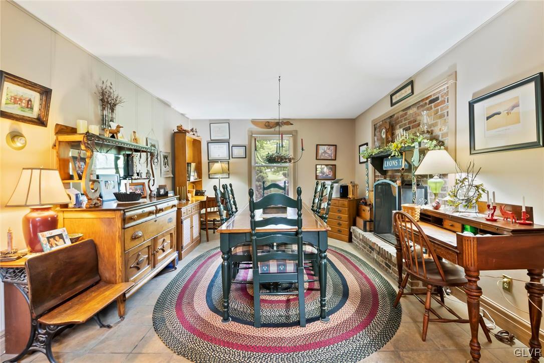 2744 Moore Circle Bath, PA 18014 - Photo 18 of 31 a living room with furniture and a chandelier
