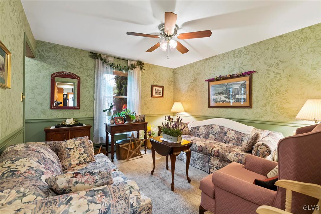 2744 Moore Circle Bath, PA 18014 - Photo 23 of 31 a living room with furniture and a flat screen tv