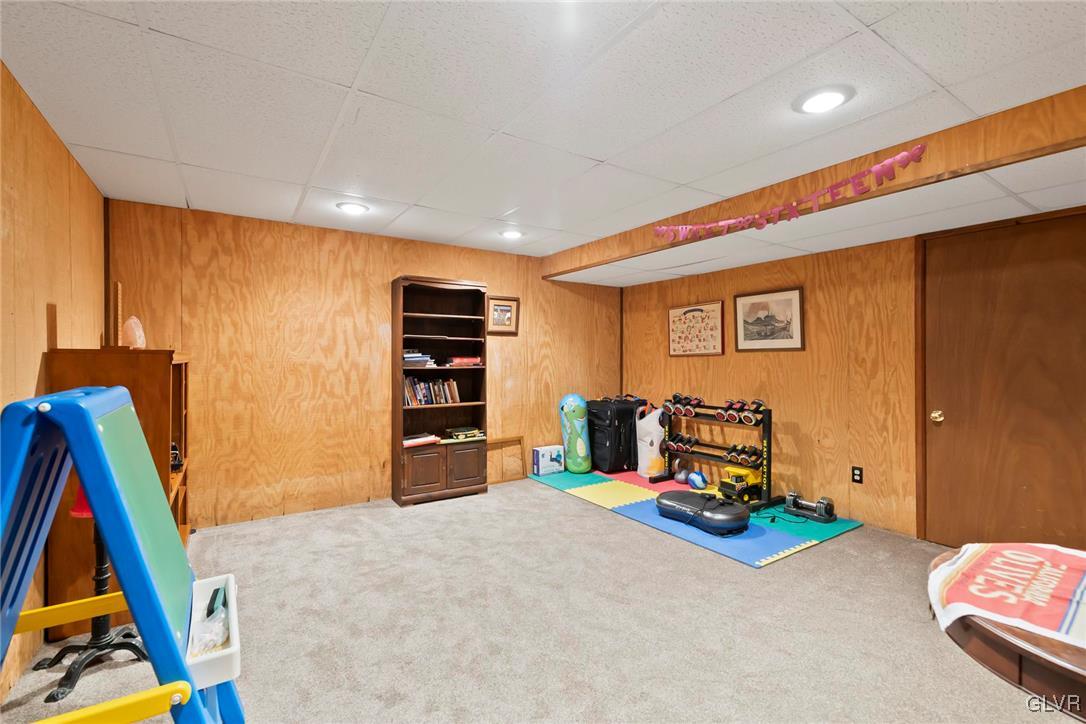 2744 Moore Circle Bath, PA 18014 - Photo 30 of 31 a living room with furniture and a flat screen tv