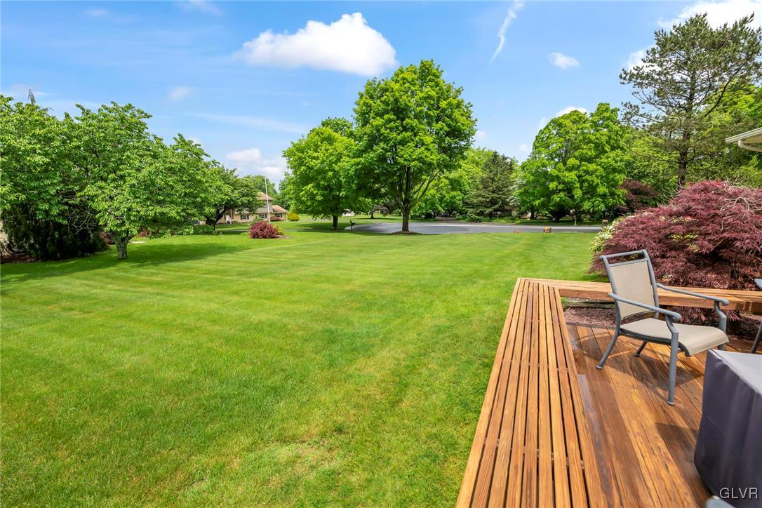 2744 Moore Circle Bath, PA 18014 - Photo 5 of 31 a view of a chairs in a yard with wooden fence
