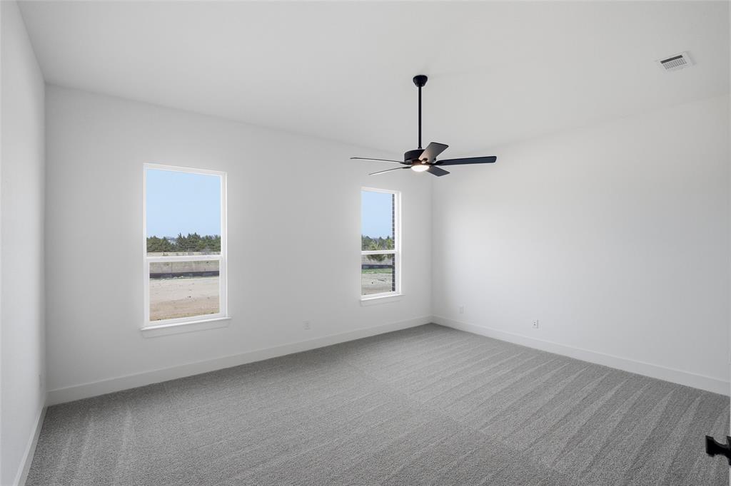 1005 Webb Court Van Alstyne, TX 75495 - Photo 16 of 38 a view of an empty room with a window