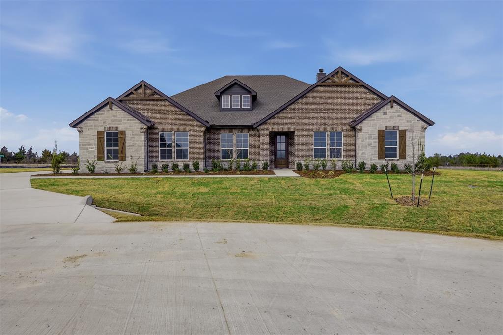 1005 Webb Court Van Alstyne, TX 75495 - Photo 3 of 38 a view of a house with a big yard and potted plants