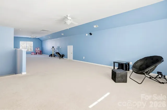 a view of swimming pool with a yard