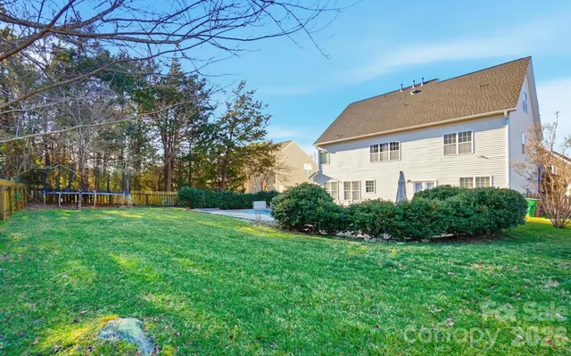 a front view of a house with swimming pool