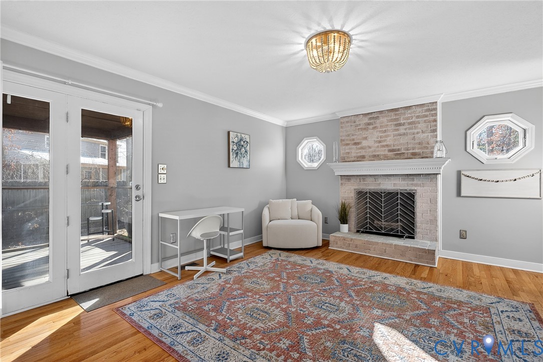 7443 Pinehurst Drive Quinton, VA 23141 - Photo 12 of 49 a living room with furniture and a fireplace