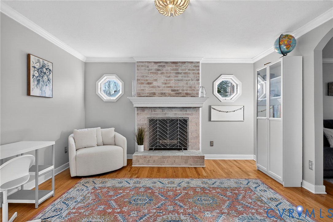 7443 Pinehurst Drive Quinton, VA 23141 - Photo 13 of 49 a living room with furniture and a fireplace