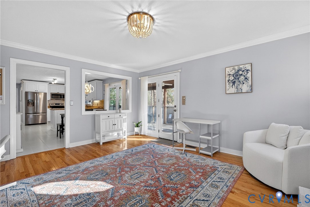 7443 Pinehurst Drive Quinton, VA 23141 - Photo 14 of 49 a living room with furniture and a rug