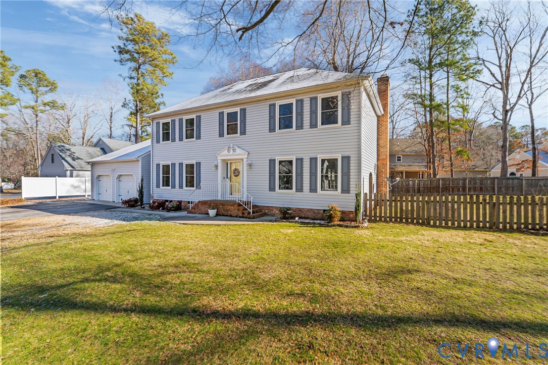 7443 Pinehurst Drive Quinton, VA 23141 - Photo 2 of 49 a front view of a house with a swimming pool