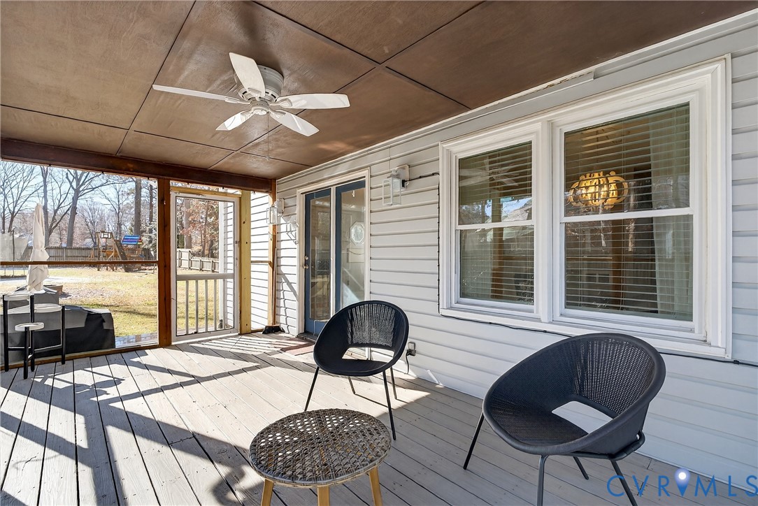 7443 Pinehurst Drive Quinton, VA 23141 - Photo 46 of 49 a living room with furniture and a window