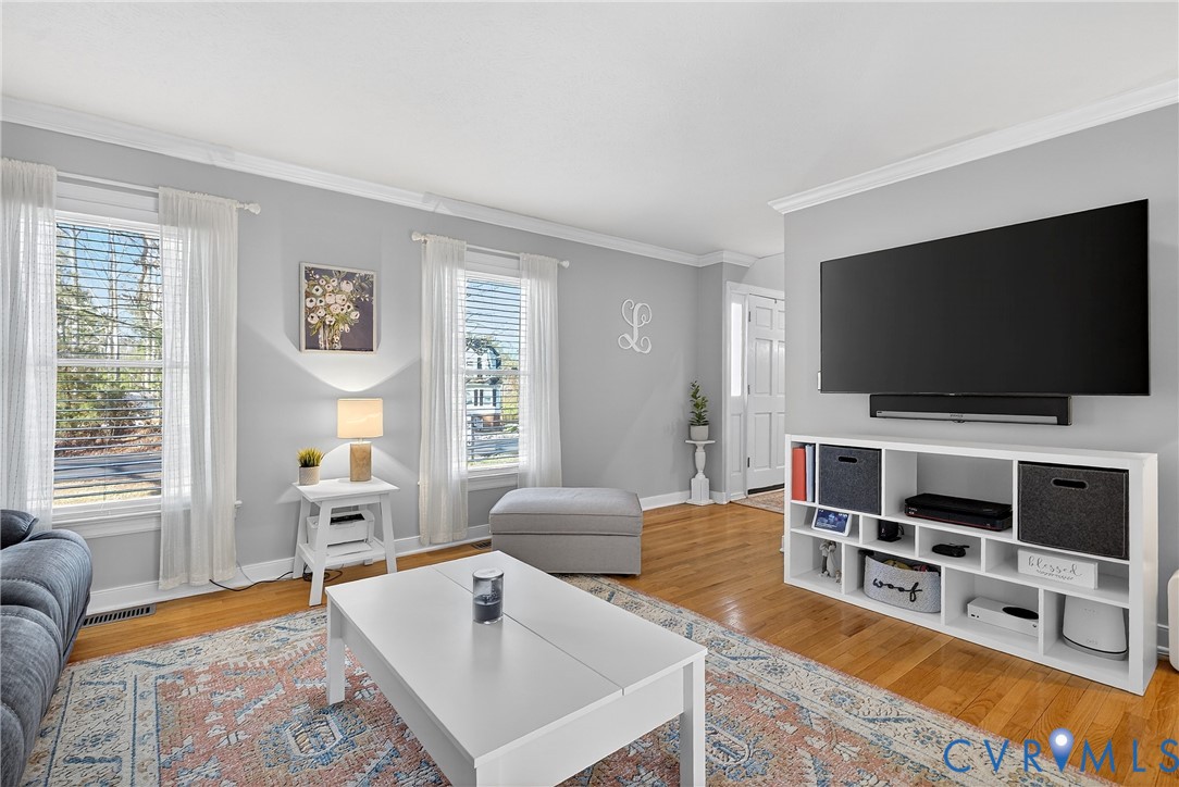 7443 Pinehurst Drive Quinton, VA 23141 - Photo 10 of 49 a living room with furniture and a flat screen tv