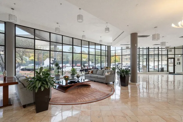 a view of hallway with wooden floor