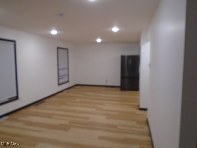10971 Auburn Road Chardon, OH 44024 - Photo 10 of 40 Unfurnished room with light wood-style floors and recessed lighting