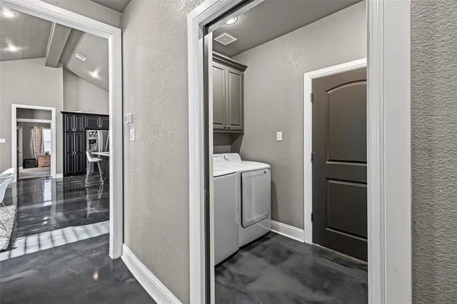 a bath tub sitting next to a bathroom sink