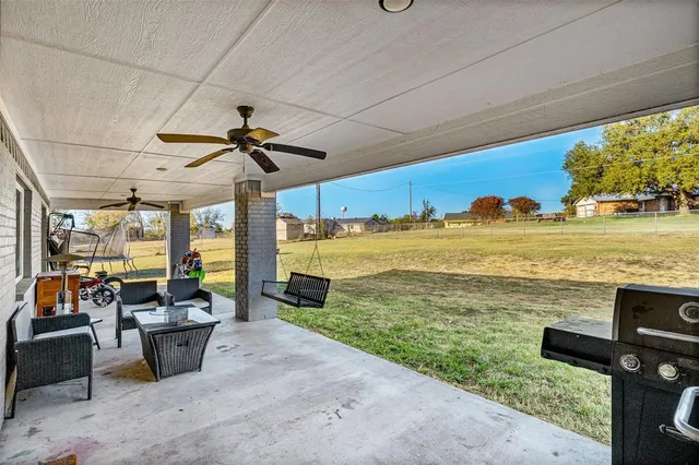 a bedroom with furniture and a bed
