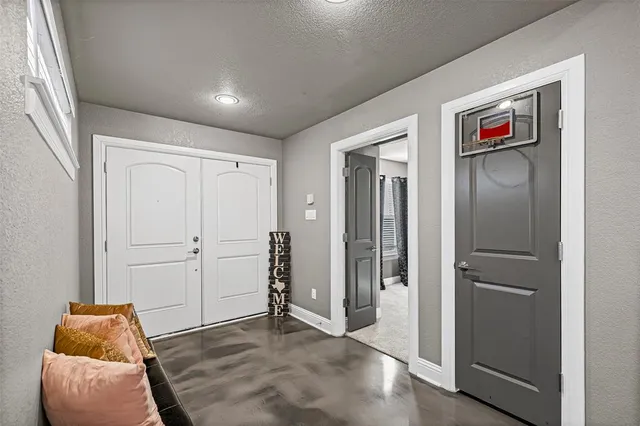 a view of livingroom with furniture and closet