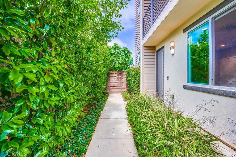 2125 Evans Way Costa Mesa, CA 92627 - Photo 2 of 41 a view of a pathway with plants