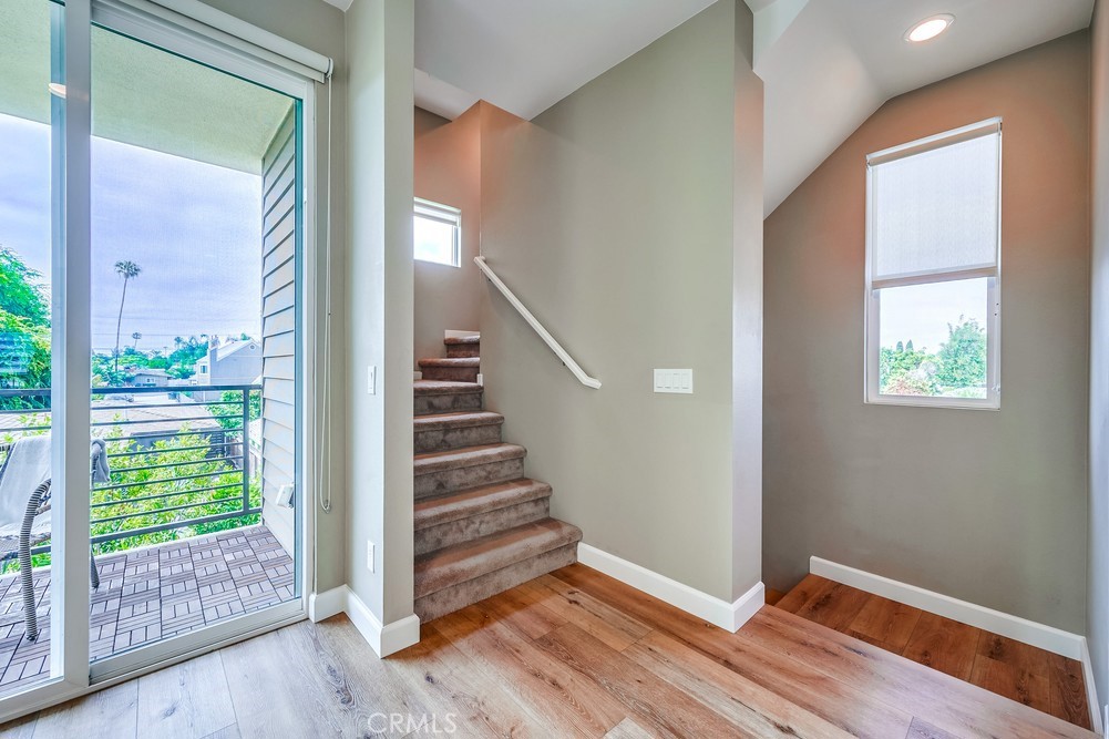 2125 Evans Way Costa Mesa, CA 92627 - Photo 21 of 41 a view of entryway with wooden floor and fan