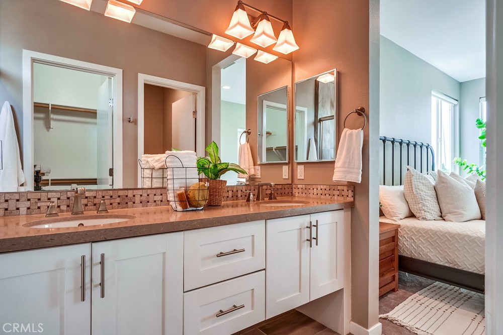 2125 Evans Way Costa Mesa, CA 92627 - Photo 26 of 41 a bathroom with a double vanity sink and a mirror