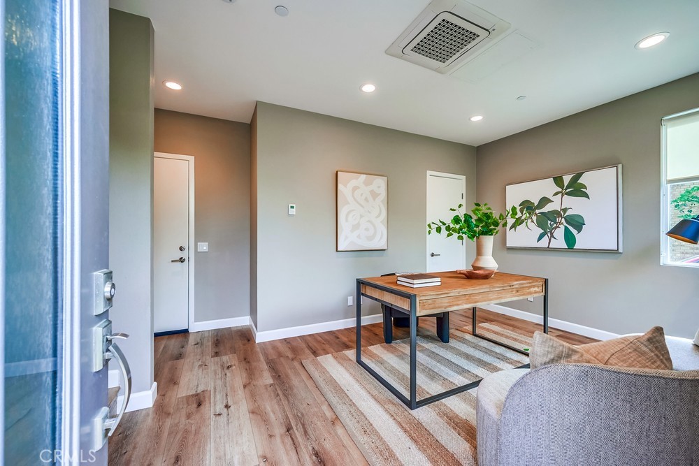 2125 Evans Way Costa Mesa, CA 92627 - Photo 4 of 41 a living room with furniture and wooden floor