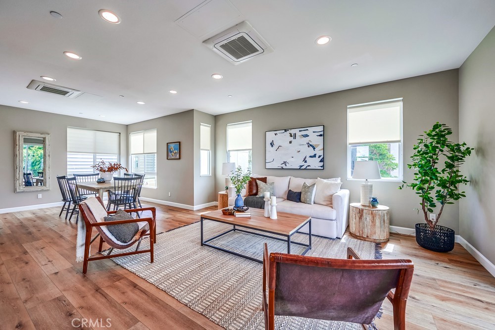 2125 Evans Way Costa Mesa, CA 92627 - Photo 7 of 41 a living room with furniture potted plant and a window