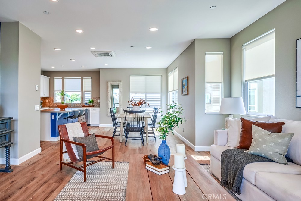 2125 Evans Way Costa Mesa, CA 92627 - Photo 8 of 41 a living room with furniture kitchen and a large window