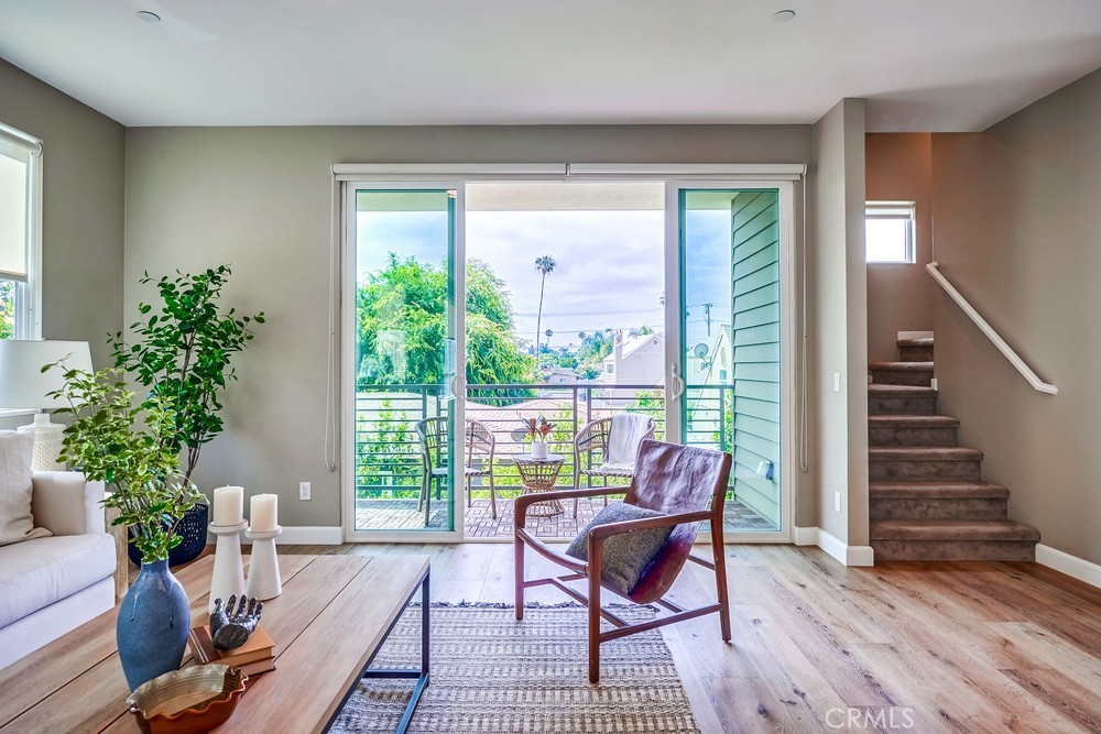 2125 Evans Way Costa Mesa, CA 92627 - Photo 10 of 41 a living room with furniture and a potted plant