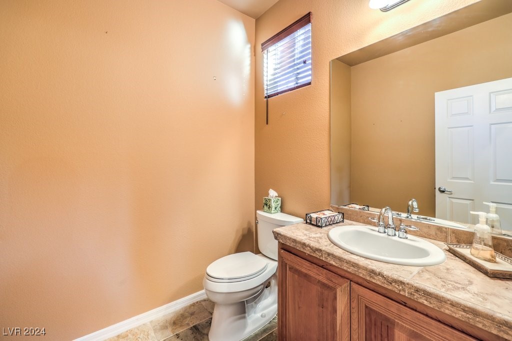 315 Foster Springs Road Las Vegas, NV 89148 - Photo 15 of 47 Half bathroom downstairs.