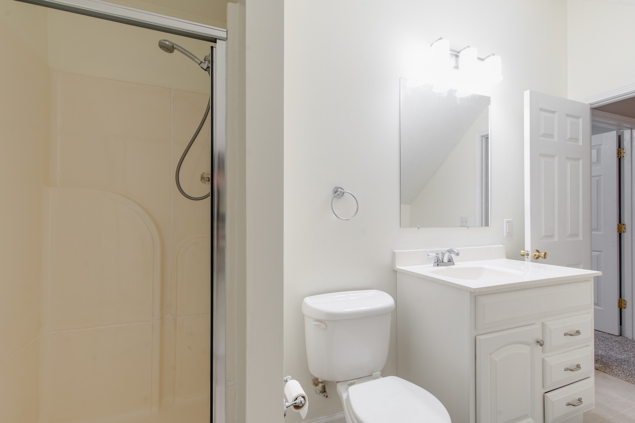 6699 East Benton Road Springfield, TN 37172 - Photo 25 of 66 a bathroom with a toilet sink shower and mirror