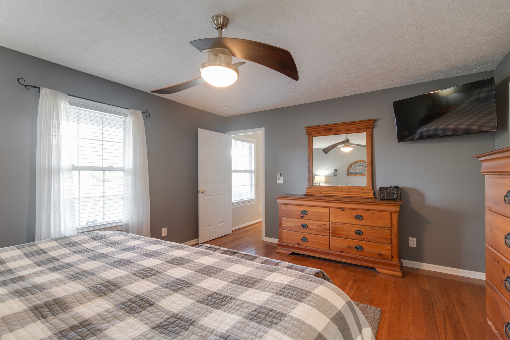 6699 East Benton Road Springfield, TN 37172 - Photo 33 of 66 a bedroom with a bed and a television