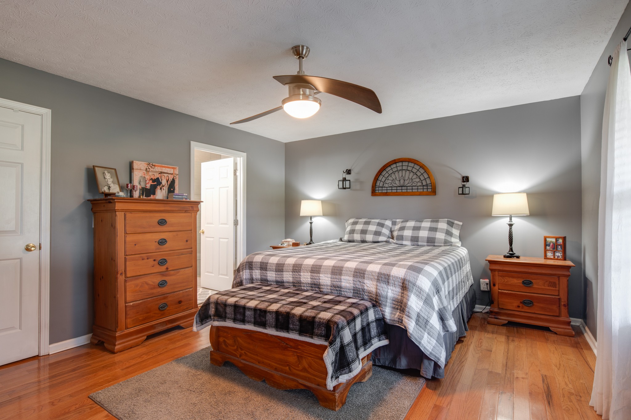 6699 East Benton Road Springfield, TN 37172 - Photo 35 of 66 a bedroom with a bed and a dresser