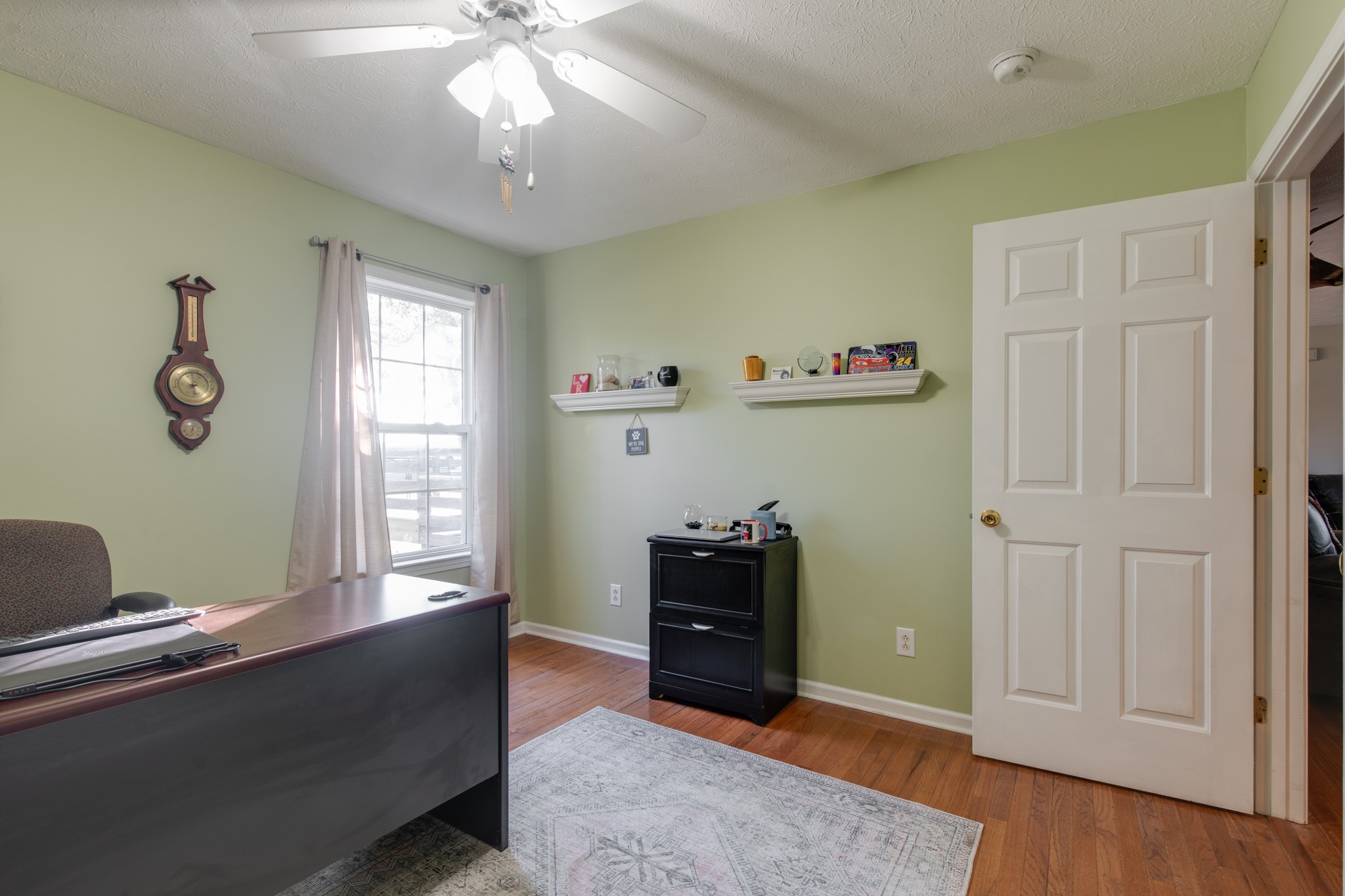 6699 East Benton Road Springfield, TN 37172 - Photo 40 of 66 a living room with furniture and a window