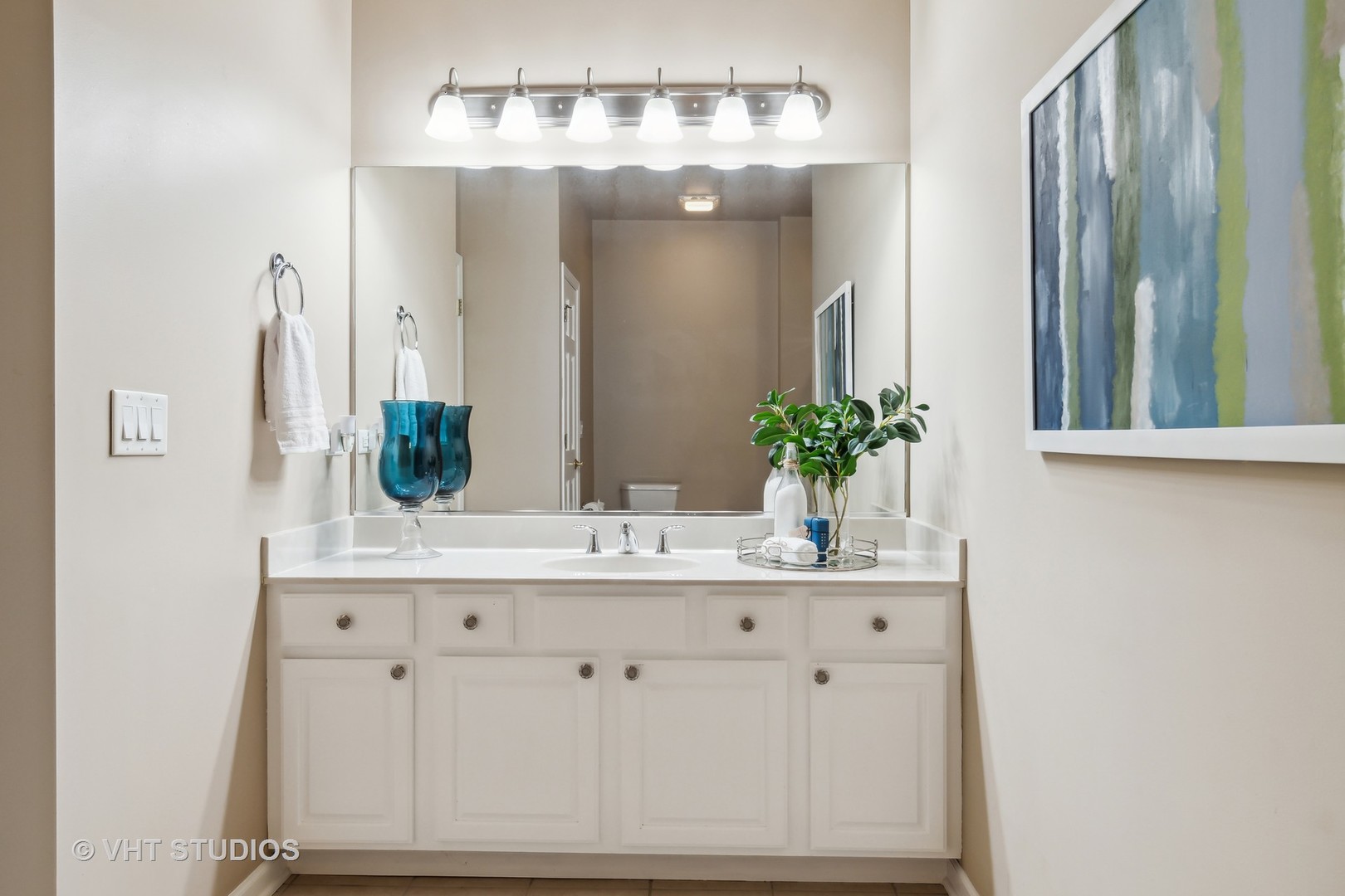 2934 Portage Street Naperville, IL 60564 - Photo 12 of 30 a bathroom with a sink and a mirror