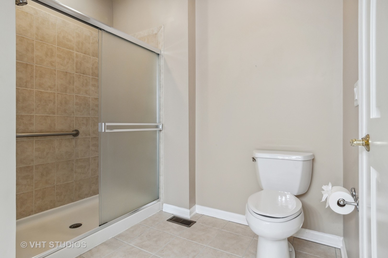 2934 Portage Street Naperville, IL 60564 - Photo 13 of 30 a bathroom with a toilet and a shower