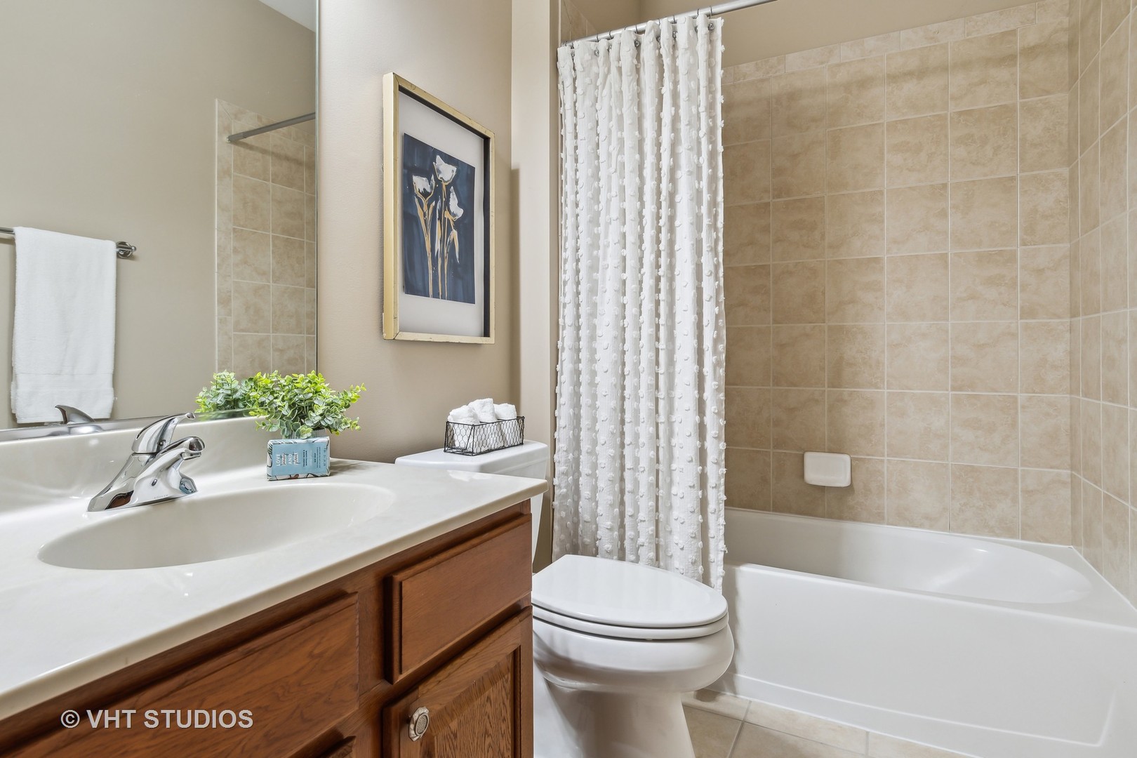 2934 Portage Street Naperville, IL 60564 - Photo 15 of 30 a bathroom with a sink a toilet and shower