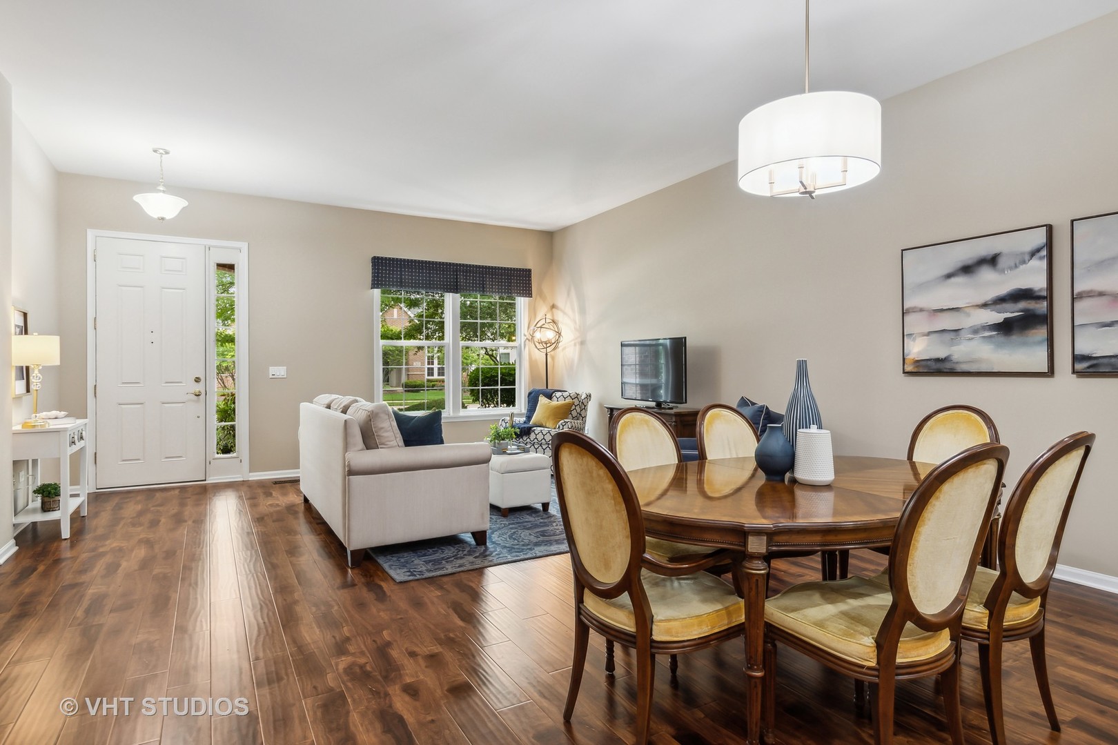2934 Portage Street Naperville, IL 60564 - Photo 4 of 30 a dining room with furniture a window and wooden floor