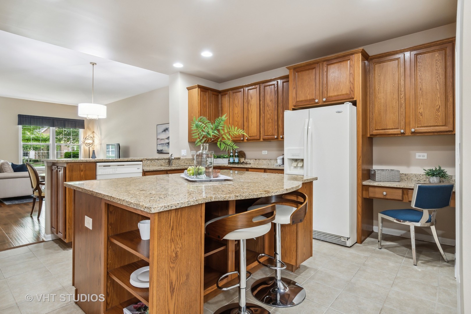 2934 Portage Street Naperville, IL 60564 - Photo 7 of 30 a kitchen with kitchen island a appliances a counter top space and a center island